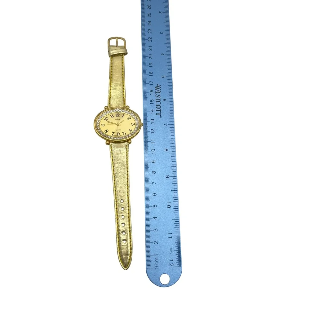 Collezio Gold Tone Oval Rhinestone Bezel‎ Watch Metallic Gold Strap Japan Movt